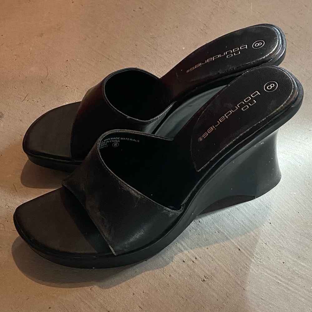 Black leather slides